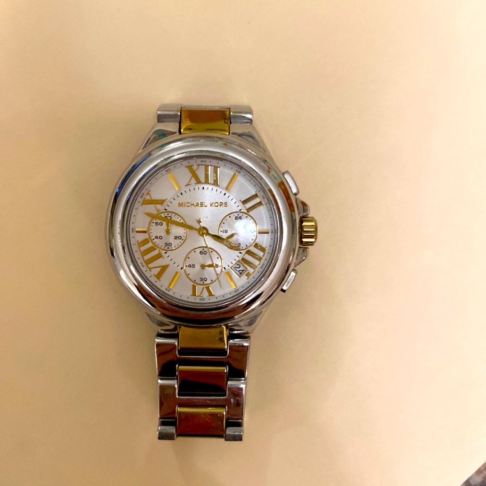 Michael Kors two toned Watch - gold and silver. Fits 6.5 inch wrist.